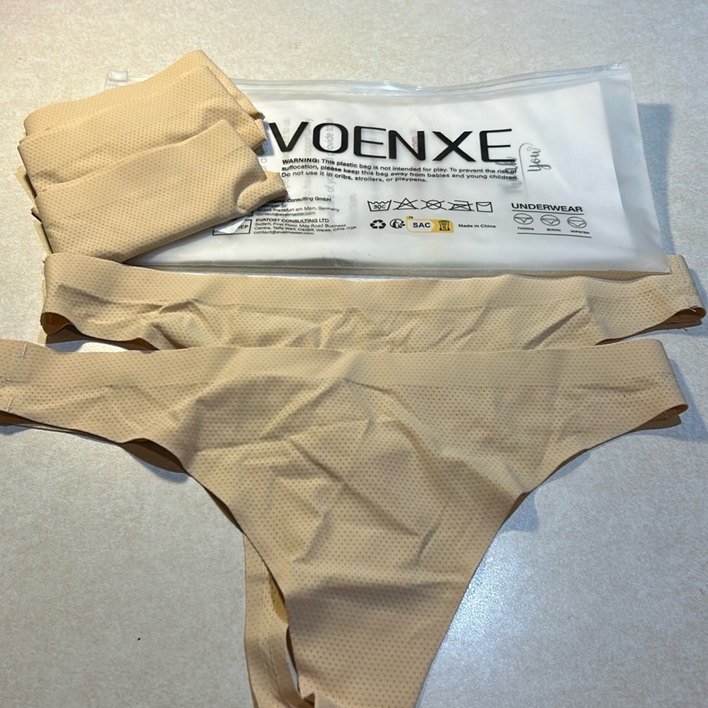 Sweat-wicking thongs in nude color, new in pkg